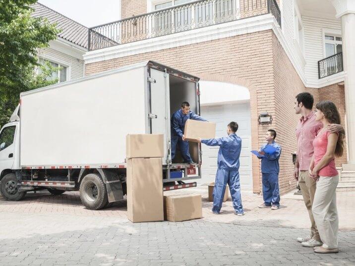long distance moving van on a city street in Milan NY